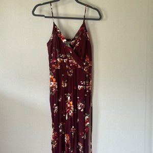 Long romper. Colors are maroon, orange, white, green. Size small. With pockets!